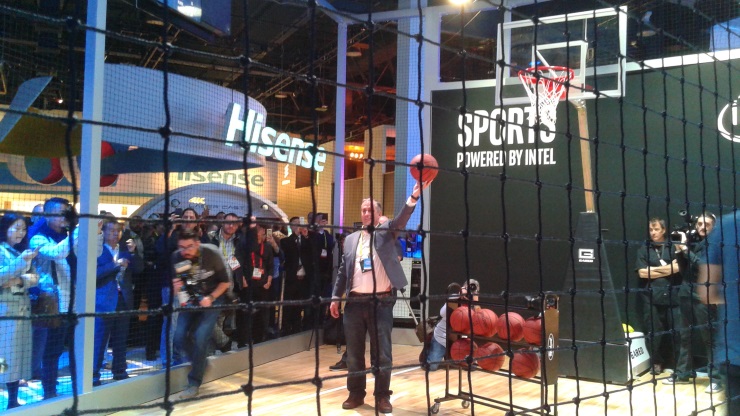 Intel CEO BK holding a basketball at CES 2017, preparing to be jumped over as part of a stunt dunk